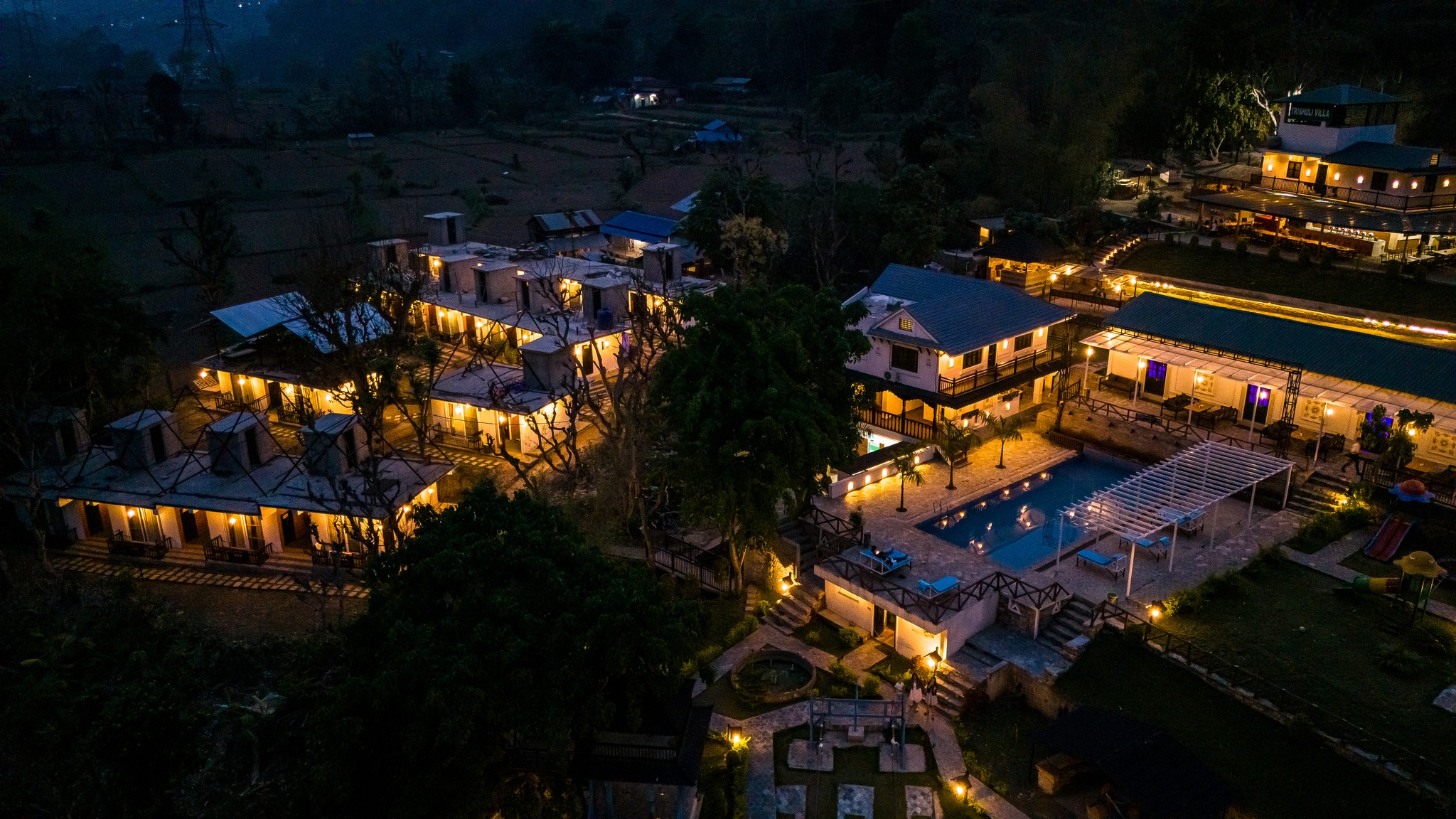 Best Couple-Friendly Villas Near Kathmandu for 2025 Nepal’s tourism sector is experiencing a increase. International arrivals has passed 1.14 million increasing 13% over the previous year. Domestic visitors now contribute to more than 70% of total tourism spending, signaling growing interest in local travel and romantic getaway near Kathmandu. In today’s fast-paced world, couples are increasingly seeking meaningful escapes, places where they can reconnect, and create lasting memories away from the daily chaos. Villas near Kathmandu have quietly been seen as one of the top choices for romantic getaways. Whether it’s a weekend celebration, an anniversary surprise, or just a break, the villas provide the perfect place for love to bloom. Unlike crowded hotels, villas offer private spaces where couples can enjoy candlelight dinners, enjoy sunset views, or simply relax in the quiet of the countryside. With growing demand for unique couple experiences, many villas are now curating specialized services like room decor, adventure activities, and wellness add-ons. The proximity to Kathmandu makes these getaways both accessible and ideal for short romantic trips. Over the years, we have experienced that the romantic escape that couples are looking for is somewhere far from the busy city of Kathmandu. Couples are looking for a place where they find peace, experience some adventure and truly be in nature. If you’re looking to escape with your partner in 2025, villas around Kathmandu are worth exploring. Trishuli villa, which is located in Benighat just 65 km from kathmandu is the best place for couple. It is a place which is far way from the city noise, where you will only find peace and hear the noise of the river flowing all the time. In 2025, travel is not just about the experiences but it is about the destinations. If you are looking for a couple-friendly villas near Kathmandu then Trishuli Villa is the one for you. Why Choose Villas for Couples Near Kathmandu? When it comes to creating unforgettable memories as a couple, couple’s choose villas. Here's why more couples are choosing villas for their getaways: 1. Ultimate Privacy Villas offer the kind of privacy that hotels often can’t. Whether it’s a quiet morning coffee on a private balcony or an evening under the stars, couples can fully enjoy each other’s company without any disturbance. 2. Surrounded by Scenic Beauty Just a short drive from the city, you’ll find beautiful greenery, peaceful riversides, and mountain views. The beautiful natural setting sets the perfect tone for romance and reconnection between the partners. 3. Balance of Adventure & Relaxation From serene river walks and gentle hikes to cozy campfires and spa-like relaxation, villas near Kathmandu provide both thrill and tranquility, depending on what you’re in the mood for. 4. Perfect for Special Moments Whether you're planning a weekend retreat, anniversary celebration, or a surprise romantic gesture, villas are made for intimate experiences. What couples look for in a villa Every couple dreams of a experience that brings them closer, away from the chaos, noises and distractions. Having welcomed couples at Trishuli villa we have come to know what exactly couples look for. Couples mainly look for the following things: Privacy Comfortable and luxurious rooms Romantic ambiance Onsite couple activities Acess to nature Safety Cleanliness Accessibility How to reach Trishuli Villa? Trishuli Villa is a great option for both last-minute getaways and planned vacations because it is conveniently located near major towns like Kathmandu, Pokhara, and Chitwan. Depending on traffic and weather, the trip from Kathmandu often takes two and a half to three and a half hours. The Prithvi Highway is the primary road; it is largely paved and kept up, though there may be some uneven spots close to curves and river crossings. The journey takes about 4 to 5 hours for those traveling from Pokhara, and 3 to 4 hours for those leaving from Chitwan (the Bharatpur region). You can take a shared jeep, a private vehicle, or a tourist bus. For gatherings or business events, the resort can offerDepending on traffic and weather, the trip from Kathmandu often takes two and a half to three and a half hours. The Prithvi Highway is the primary road; it is largely paved and kept up, though there may be some uneven spots close to curves and river crossings. Romantic Highlights of Trishuli Villa: We have gained the reputation of being a great escape for the couples. Trishuli villa is recognized by the returning guests, travel bloggers and hospitality professionals. Our romantic offerings are thoughtfully designed and expertly maintained to ensure that you will be able to create unforgettable moments. We have mentioned the romantic highlights of Trishuli Villa below: Swimming Pool Alongside the trishuli river, we have a luxury poolside area. It is best for morning swim or swim during the sunset. It is one of the most loved features of the trishuli villa. Riverside Bar and Lounge Our riverside bar and lounge is perfect for the evening ambiance. The riverside bar is the perfect place to have drinks in the evening. Comfortable Glamping tents If you and your partner loves nature but want to stay somewhere comfortable then glamping tents is the perfect choice. Each tent has a beautiful view and a private fire pit. It is a great choice for adventure loving couples who wants to enjoy the outdoor but with luxury. Private rooms Our rooms are specially to offer both comfort and privacy. We have clean and spacious bathrooms and a caring service. You will find peaceful atmosphere and great hospitality service here. Fun outdoor activities If you are looking for fun activities to do with your partner then trishuli villa offers many fun and adventorous activities like rafting,kayaking, zipline,sky cycling, hiking or peaceful walks near the villa. We also have trained guides who will make sure you will have a safe and enjoyable experience. There is a dedicated sports area where you can enjoy various sports such as pool, table tennis, and badminton. Spa Trishuli villa also provides spa services where you and your partner can rejuvenate and relax while having sauna and steam. Candlelight dinners You can enjoy our candlelight dinners and private bbq and campfire. Best Packages for Couples at Trishuli Villa: Trishuli Villa has a package especially dedicated for the couples. There are 3 types of packages you could choose from. The three types of packages are: Blissful Package: You can get this romantic package at a price of Rs.9000. In this package, you will receive: deluxe room with a balcony, a beautiful scenic view, complimentary dinner, breakfast and lunch, welcome Deluxe room with a balcony A beautiful scenic view Complimentary breakfast, lunch and dinner Welcome drinks on arrival Access to outdoor seating area and garden area Swimming, steam and sauna Harmony Package This package is available at just Rs 12000. It includes amenities such as: Privacy room with river view Candlenight dinner Complimentary breakfast, lunch a dinner Swimming Steam and sauna Sky cycling and zipline (for one) Serenity suite This exclusive package comes at a rate of 15000. This package includes amenities such as: Luxurious suite room with river view Private balcony and living area Romantic dinner beside the garden or by the pool Complimentary breakfast, lunch and dinner Special aminitues such as chocolates, wine bottles, rose petals etc Sky cycling and zipline for the couples Customer Reviews and Testimonials Working all these years in this sector we are grateful to have received lots of positive feedbacks. We have been able to gain trust through our genuine care and honest service. We have received lots of reviews on our couple friendly services. “Rashmi Devkota” who had visited our resort has added a review on how her experience was on Trishuli villa and about our great hospitality. Booking tips for couples If you planning to visit Trishuli Villa, here are some expert tips that might help you plan your trip: Book in advance: Since Trishuli villa is popular among couples and weekend travelers, we recommend booking atleast 2 or 3 weeks in advance. Private villas and glamping tents gets filled fast. Look for exclusive couple packages: Trishuli villa has seasonal offers for couples that includes romantic dinners, private pool access, spa and many mire. These are the limited time packages that offers great value and provides you with the unforgettable experience. What to Expect: Romantic Experiences Near Kathmandu Whether you are stepping out for a romantic river walk, or exploring nearby hiking trails, the surrounding area is full of moments that brings you closer. It’s not just about doing activities but it is about making memories together in nature. Evenings here are very special. You can enjoy campfire nights under the stars, sunset views over the river, private dinner in the garden area or by the pool or candlelight dinner. These little moments will be the highlights of your trip. It is surrounded by greenery, the sound of flowing water and open skies. Nature plays an important role in creating the calm and closeness that couple needs. We provide atmosphere where the love feels effortless and unforgettable. Conclusion: When it comes to choosing a villa, it is important to find a place that offers beautiful rooms and scenic views and Trishuli villa offers it all. At Trishuli resort, we offer more than just beautiful rooms and scenic views. We have thoughtfully crafted the couple packages that provides a memorable experience for the couples. If you're looking for a peaceful, romantic getaway near Kathmandu in 2025, villas like Trishuli Villa offer the perfect balance of privacy, comfort, and connection with nature. Whether it’s a weekend escape or a special celebration, couples love the tranquil ambiance, thoughtful service, and unique experiences designed just for two. FAQs 1. Are the villas suitable for honeymooners? Yes, Trishuli Villa is a popular choice for honeymooners. With private accommodations, romantic setups, and scenic surroundings, it's perfect for celebrating your new journey together. 2. Is transportation provided from Kathmandu? We offer transportation assistance upon request. Whether you're arriving by private vehicle or need a pickup arranged, our team can help make your journey smooth and hassle-free. 3. Are vegetarian and special dietary needs accommodated? Absolutely! Our kitchen team is happy to prepare vegetarian, vegan, or custom meals based on your preferences. Just let us know in advance. 4. Can couples organize private events or celebrations? Yes, couples can plan private dinners, surprise proposals, anniversaries, or mini celebrations. We’ll help you create a memorable experience tailored to your vision.